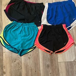4 pairs of Nike shorts different colors